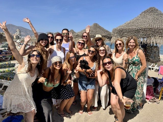 Group photo of the members on the beach at our first event