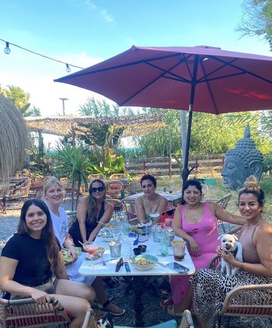 Members around a table at a meet-up in Estepona, June 2026